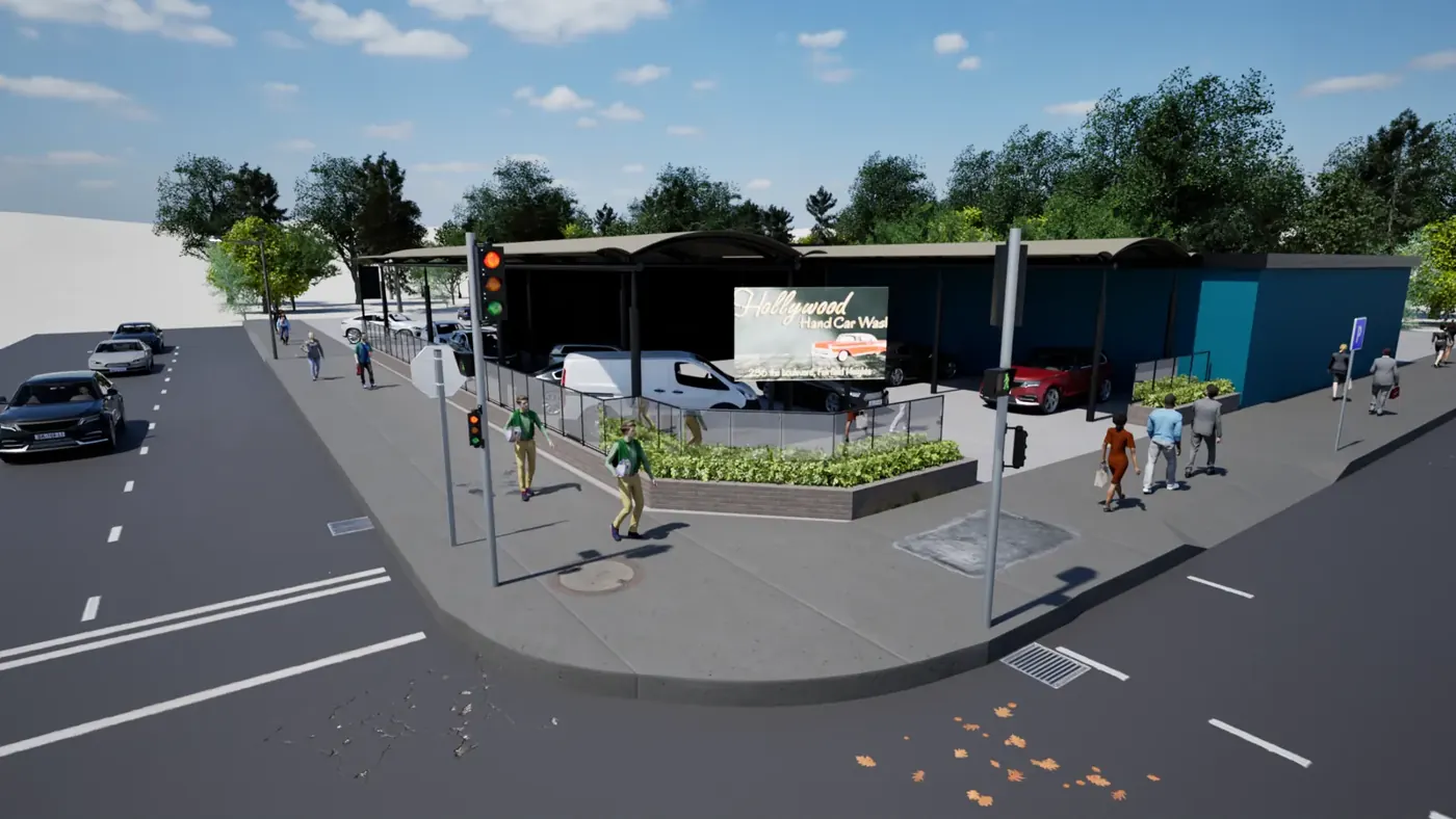 Render 1 of 5: corner hand car wash with curved canopy and landscaped planter, Fairfield Heights